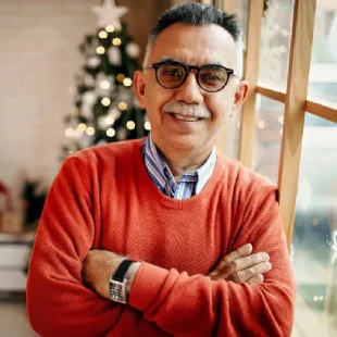 Senior man expressing satisfaction with improved comfort and confidence in daily life
